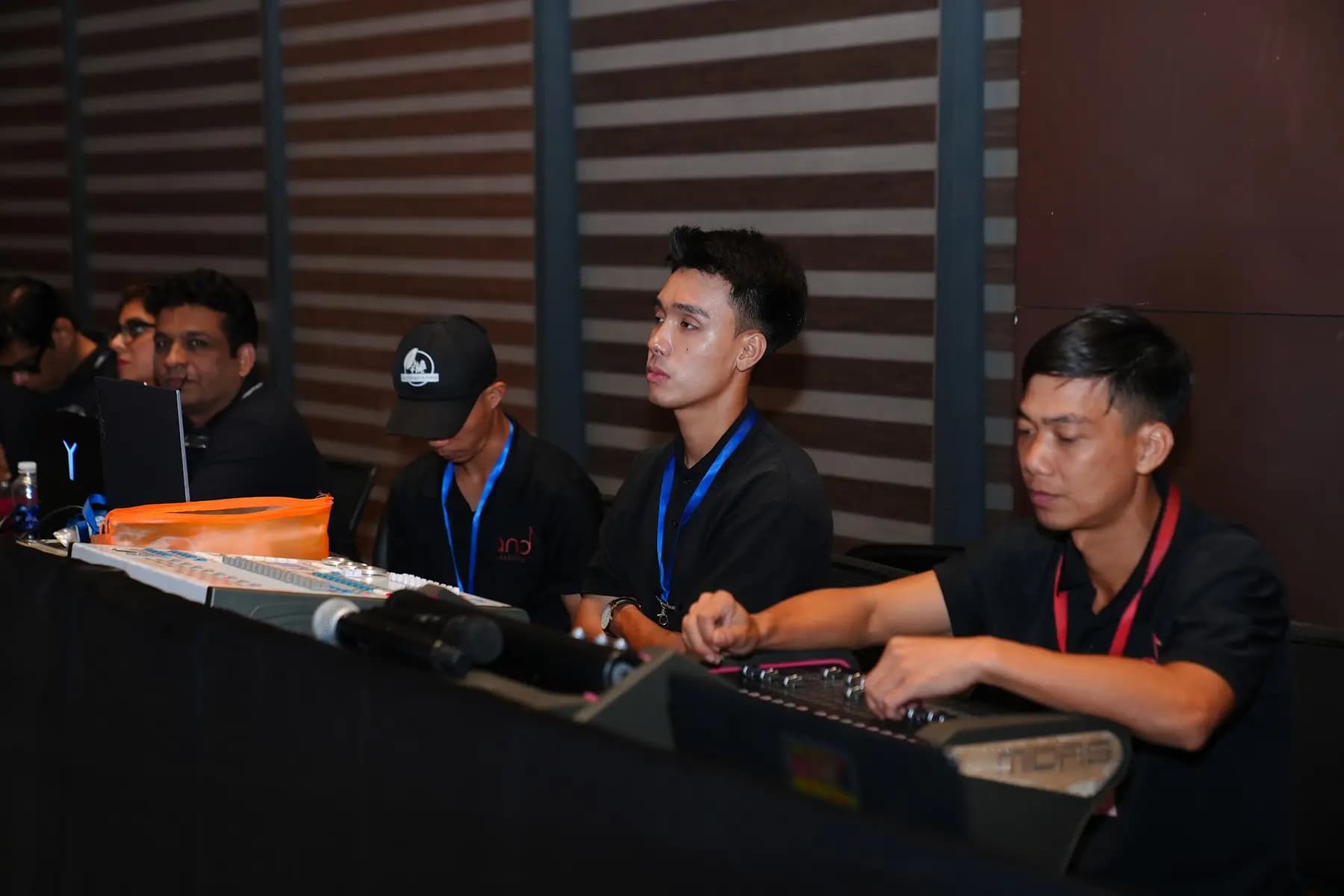 Ana technicians at the sound and lighting control desk