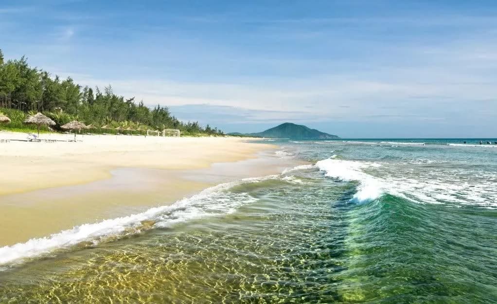 Waves on the long white sand beach of Lang Co