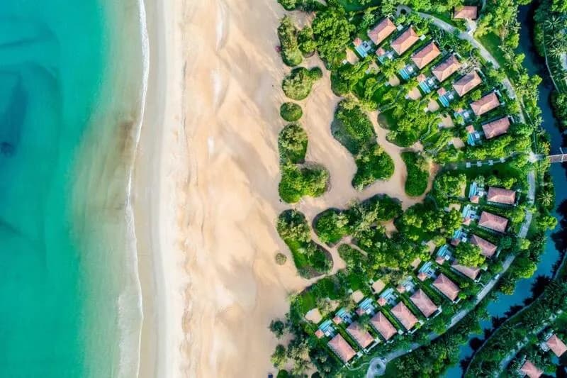 Beachfront resort villas among trees along Lang Co bay
