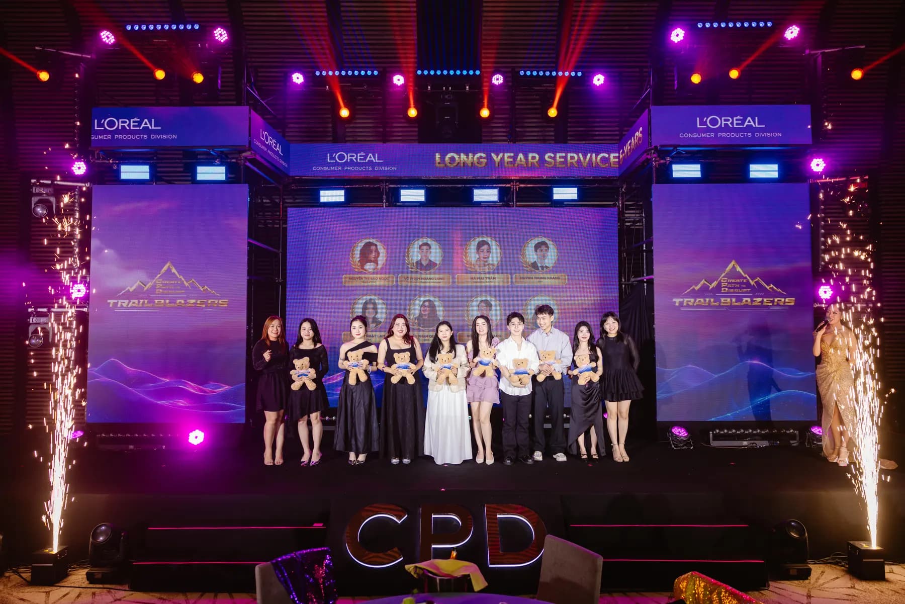 Long service award winners lined up on stage