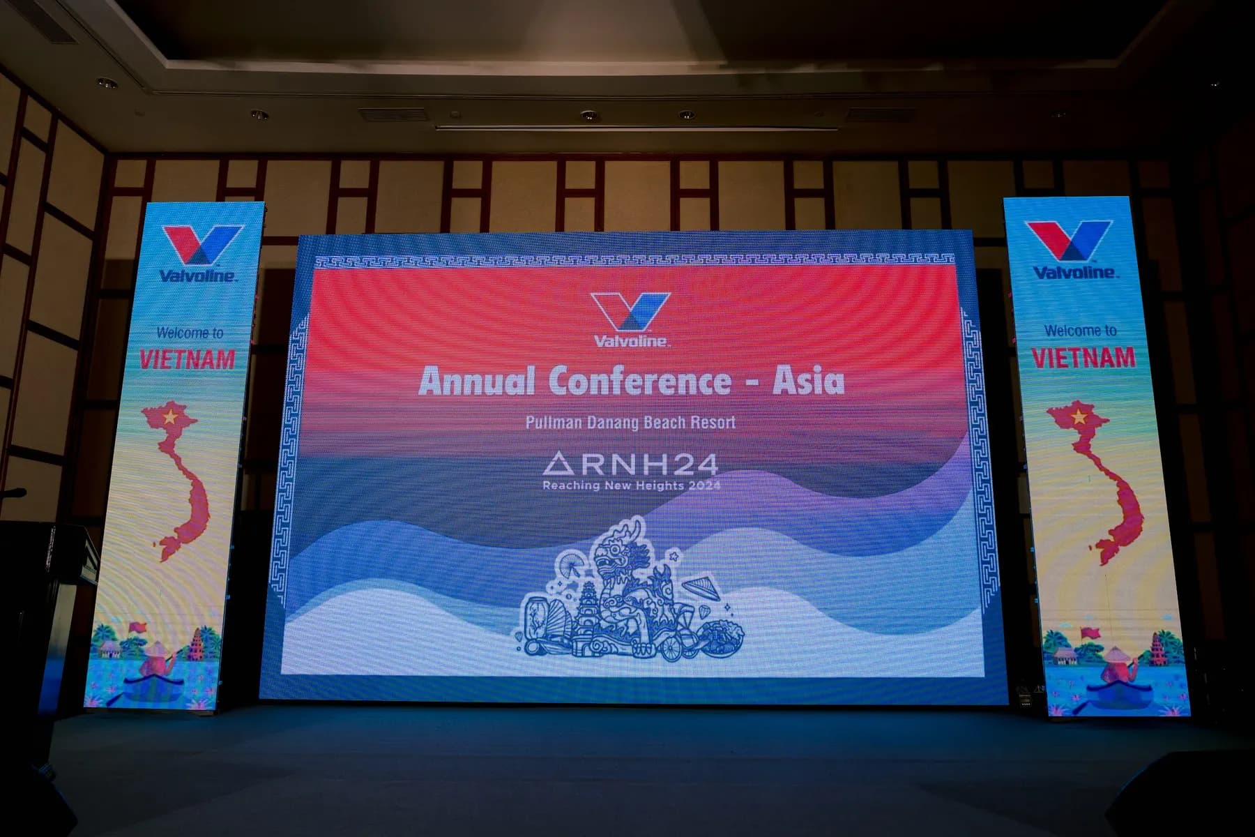 LED wall and side banners showing the Annual Conference Asia key visual